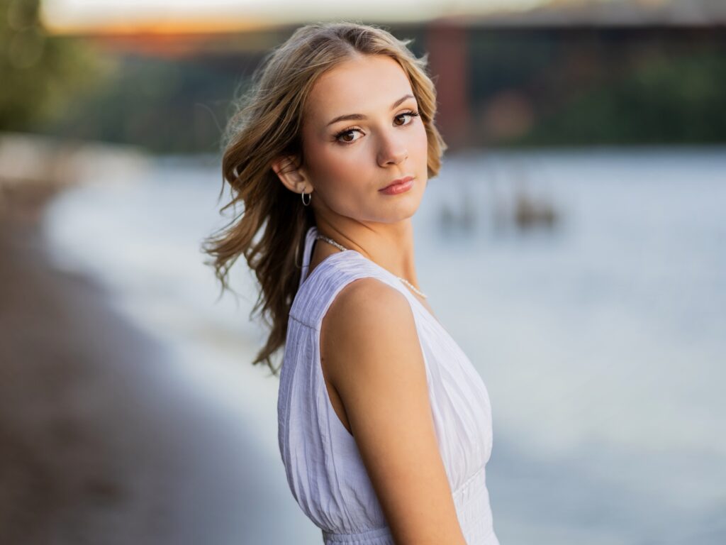 Girl by a river outside of Portland Oregon for senior portraits