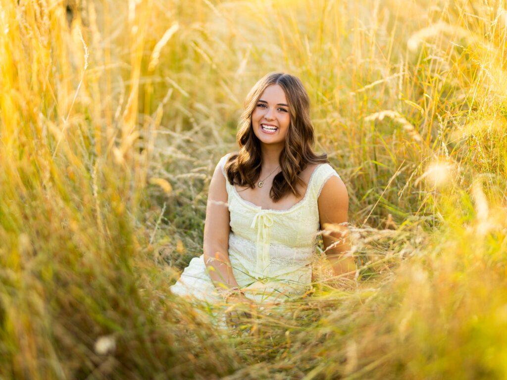 Senior photos in Vancouver Washington and Portland Oregon in the summer tall grasses in a dress