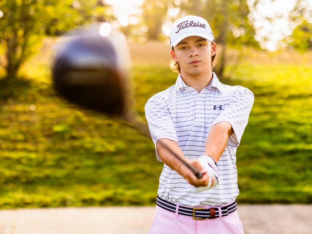 Guy senior photos in Vancouver Washington and Portland Oregon in summer with golf attire and golf club