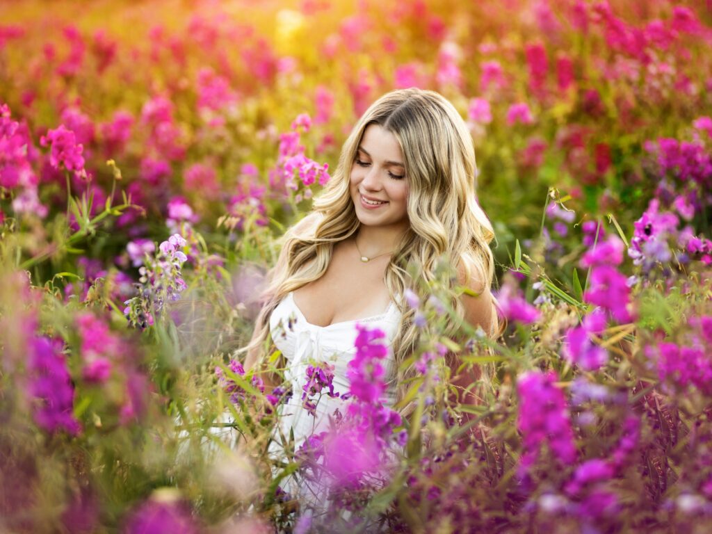 Senior photos in Vancouver Washington and Portland Oregon in the summer and cheer photos in a flower field