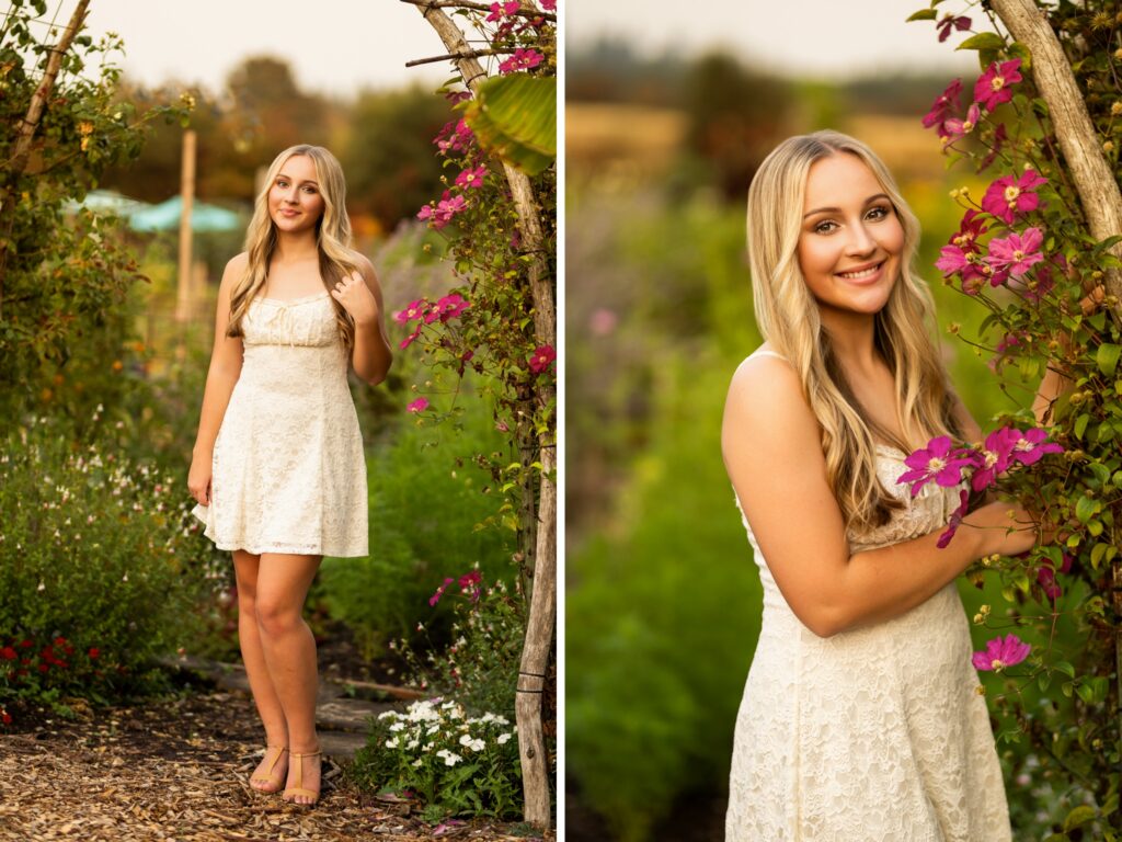Girl senior photos in Lake Oswego, OR in the late summer during golden hour and she's wearing a white dress in a flower garden