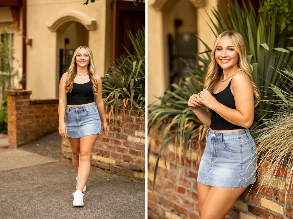 Girl senior photos in Lake Oswego, OR in the late summer during golden hour and she's wearing a simple black top with jean skirt in a city setting with bricks and palm fronds which give a Mediterranean look to the photo.