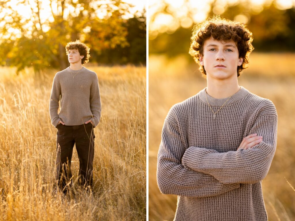 Boy senior photos in Vancouver, WA during golden hour wearing a taupe knit sweater in a tall grass field.
