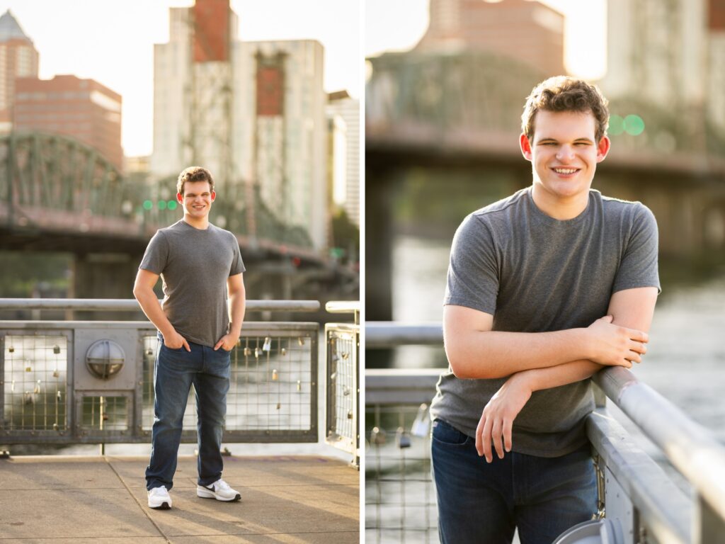Guy senior photos in downtown Portland, OR during golden hour wearing a gray t-shirt and jeans with the Portland skyline in the background.