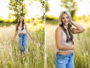 Girl senior photos in Vancouver, WA wearing a floral cami and blue jeans while standing in a golden grass field during a warm summer evening.