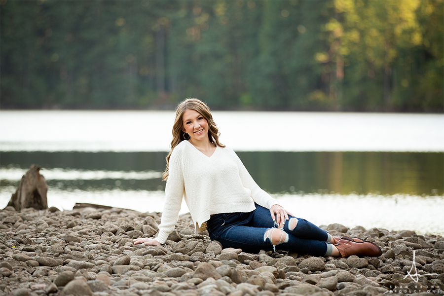 Nature and urban senior photos in Vancouver Washington in a forest by a lake
