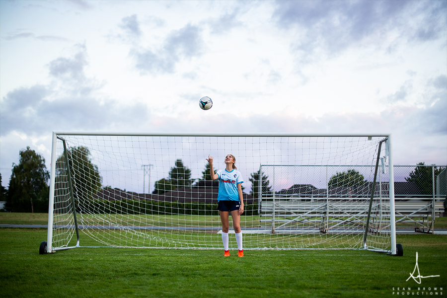 Nature and urban senior photos in Vancouver Washington soccer photos with sunset