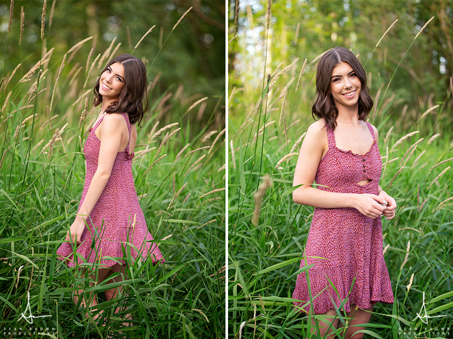 Nature and urban senior photos in Vancouver Washington in a grass field
