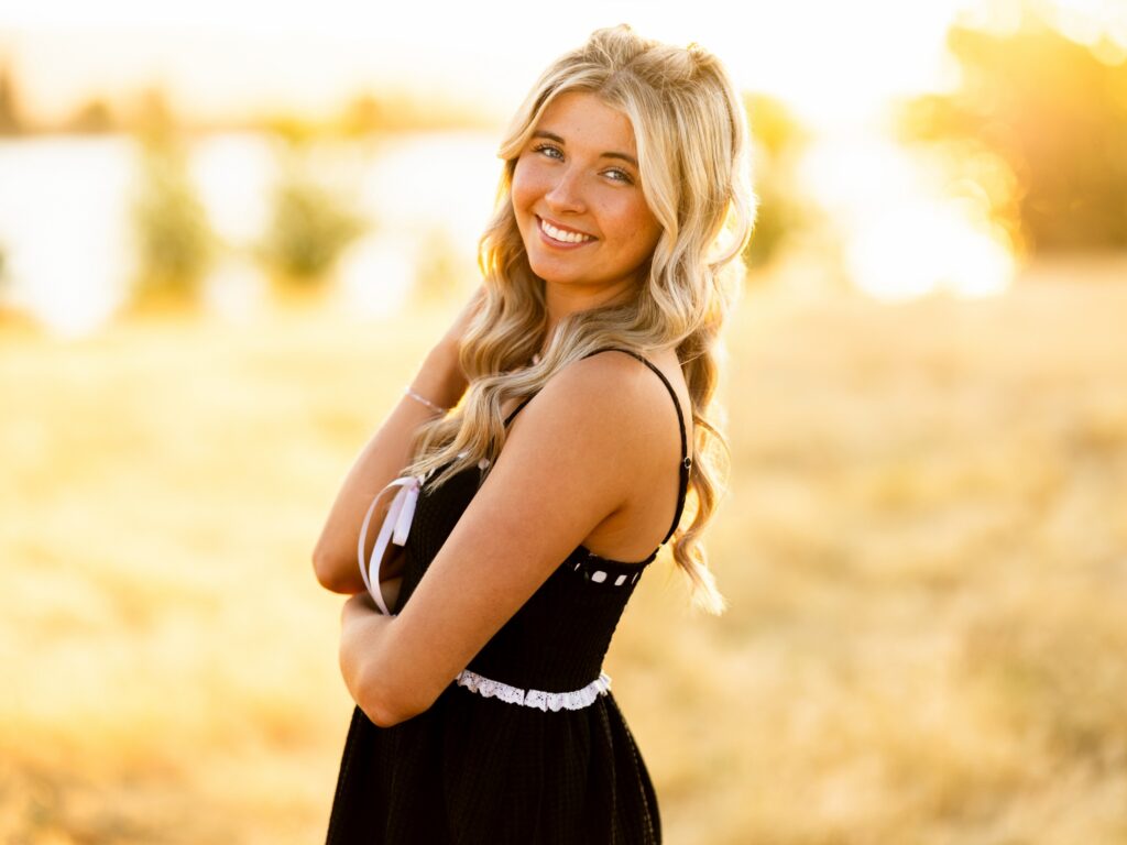 Senior photos in Vancouver Washington and Portland Oregon in the summer in a grass field